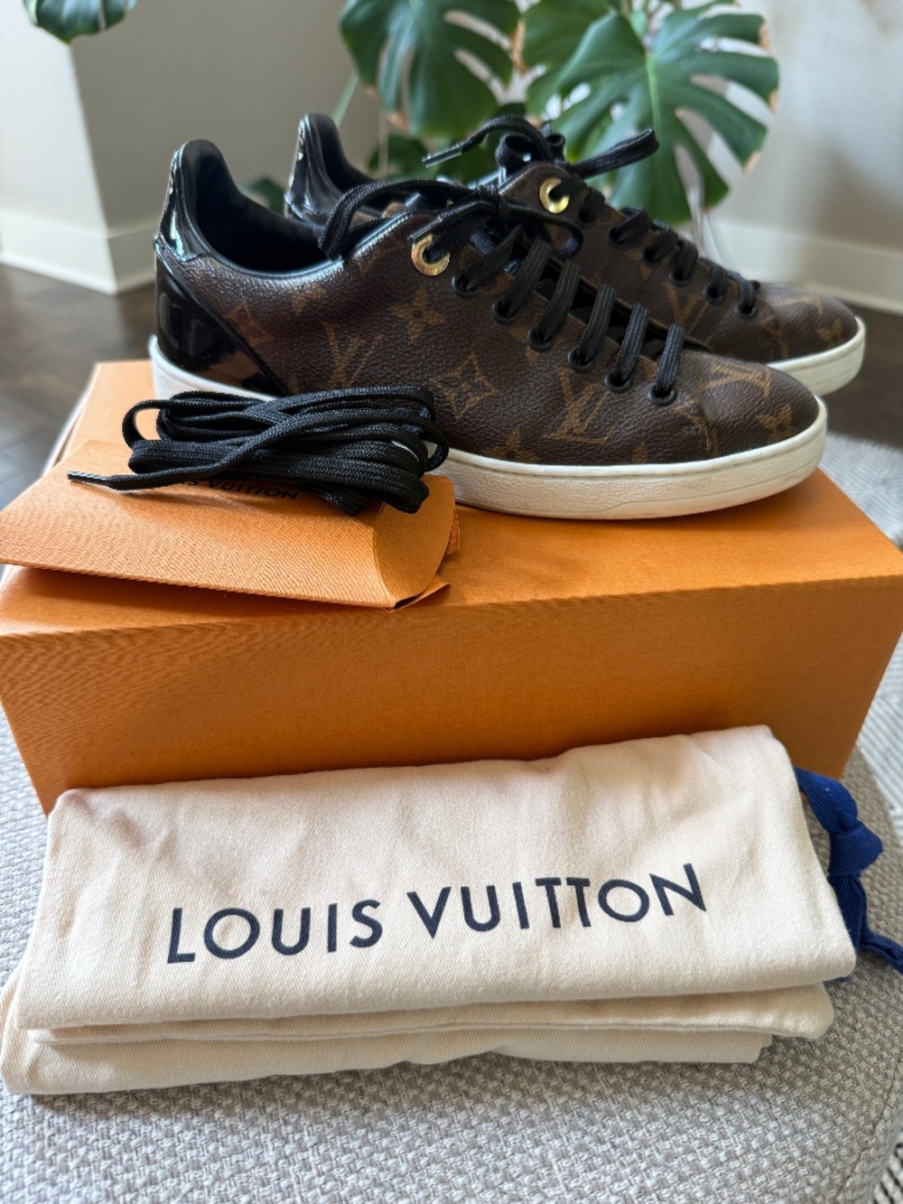 Louis Vuitton Frontrow Sneakers in iconic Monogram canvas with black patent leat